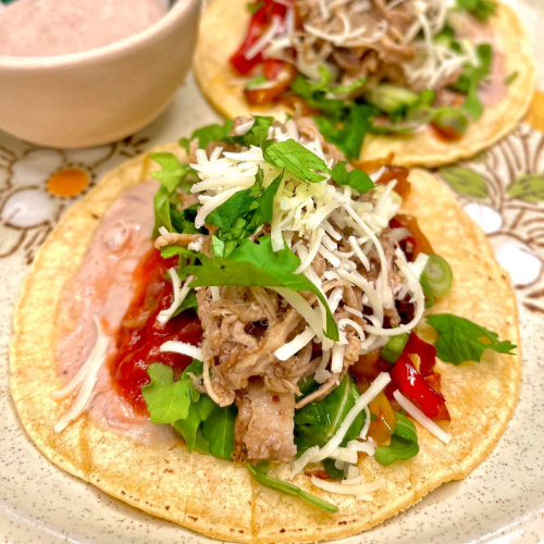 Spicy Slow Cooker Citrus Carnitas with Cherry Chipotle Rosehip Hibiscus Crema